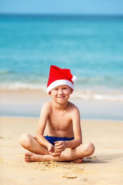 Portrait of cute little boy in Santa hat — Stock Photo, Image