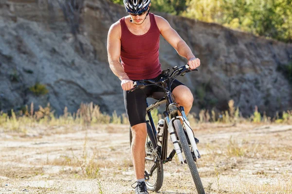 Athlete man cycling on a bicycle — Stock Photo, Image