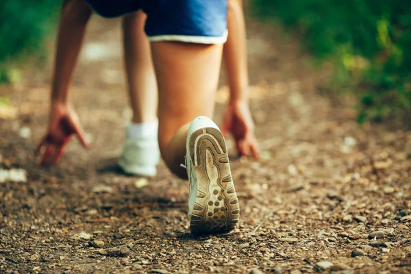 Closeup runner shoe on park trail — Stock Photo, Image