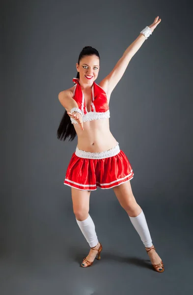 Sportief Slank Brunette Meisje Rood Wit Cheerleader Kostuum Poses Camera — Stockfoto