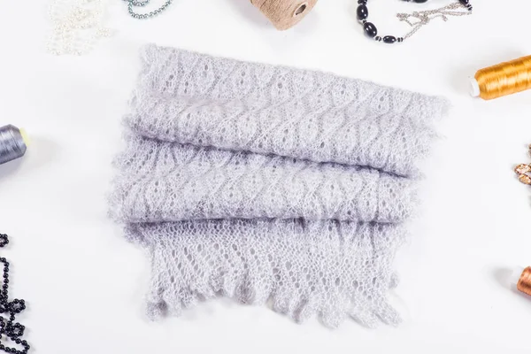 Top view closeup on folded handmade grey woolen scarf with knitted pattern Royalty Free Stock Photos