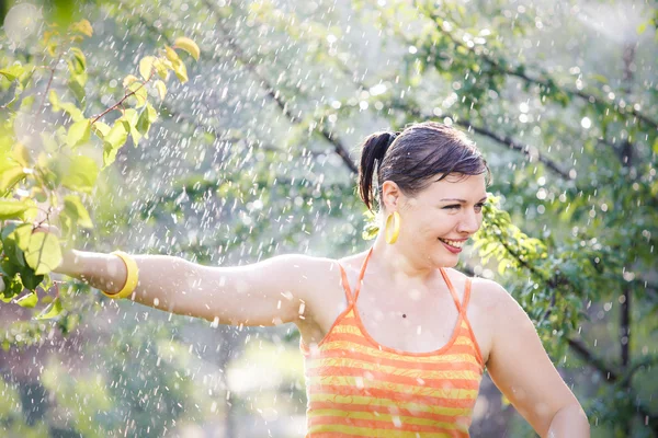 Beautiful girl in garden — Stock Photo, Image