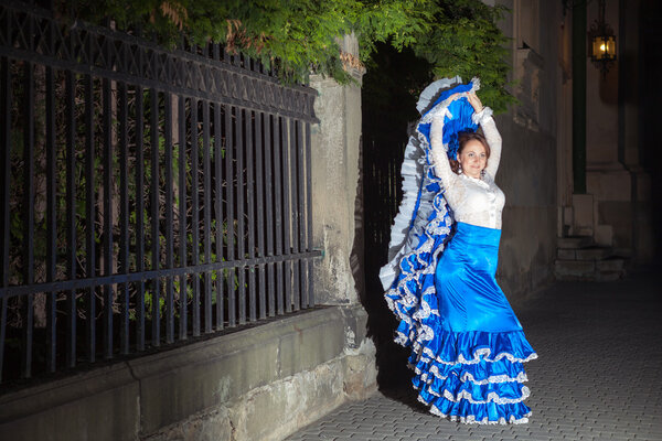 flamenco dancer in old city street