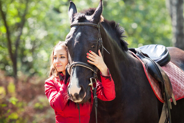 happy couple and horse