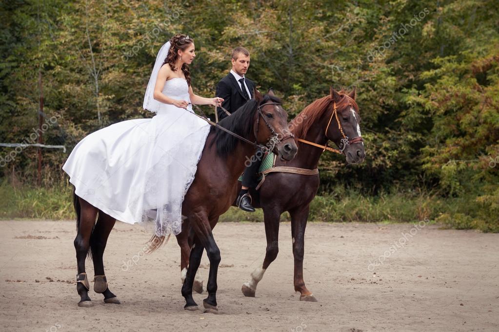 Wedding couple on horses Stock Photo by ©alkiona25 54612911 Wedding Couple On Horses Stock Photo By ©Alkiona25 54612911