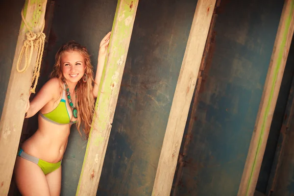 Beautiful blonde girl in swimming suit — Stock Photo, Image