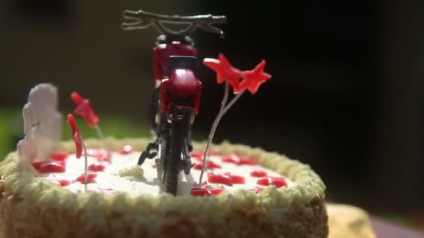 Birthday cake with motorcycle figure — Stock Video