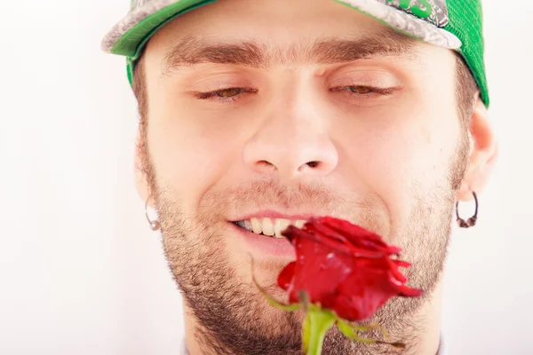 Handsome man with red rose — Stock Photo, Image