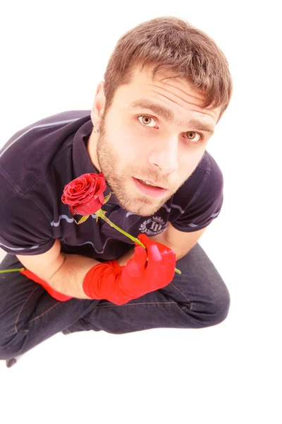 Bel homme avec des gants rouges — Photo