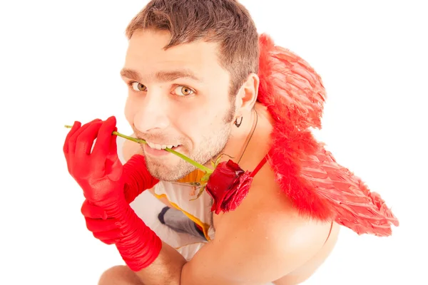 Young man red rose hold in mouth — Stock Photo, Image