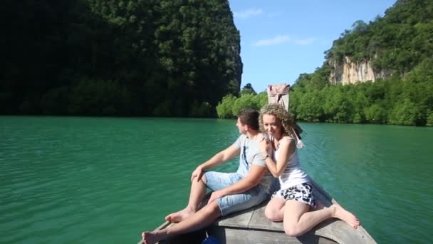 Girl with boyfriend hugging on boat — Stock Video