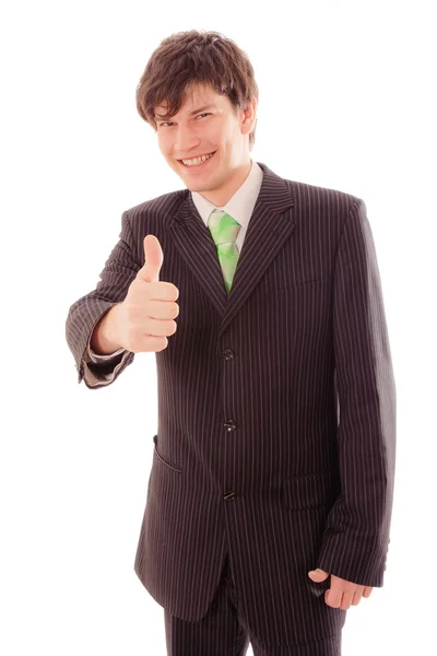 Sonriente joven en traje a rayas y corbata muestra el pulgar — Foto de Stock
