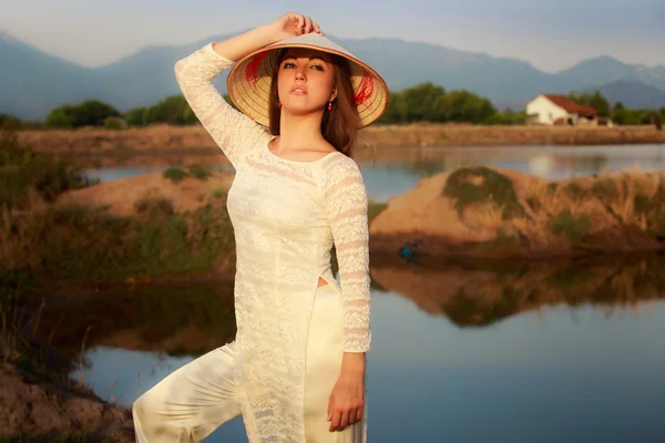 Girl in Vietnamese hat — Stock Photo, Image