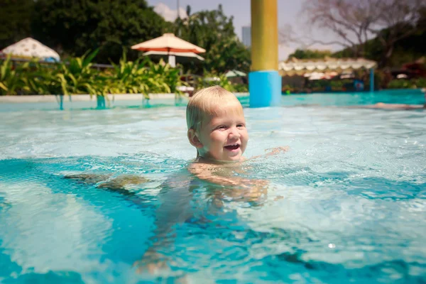 small girl in swimming pool