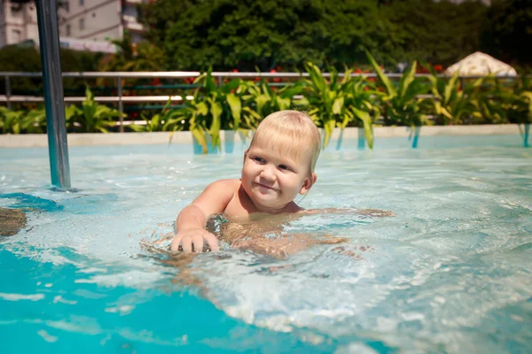 small girl in swimming pool