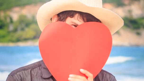 Guy with Valentines day heart — Stock Video