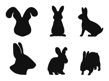 Beyaz arka planda bir çift tavşan silueti. Vektör illüstrasyonu