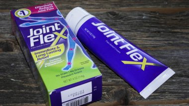 NORWALK, CT, USA- OCTOBER 10, 2025: Joint Flex pain relief cream, displayed alongside its packaging, offers effective relief from joint pain. The cream is designed for immediate and long-lasting effects, ensuring user comfort.