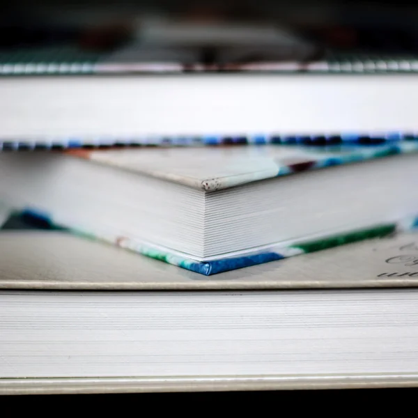 Pile of books on a black background — Stock Photo, Image