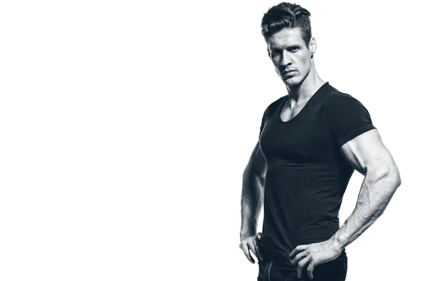 Portrét muže fitness tričko a džíny — Stock fotografie