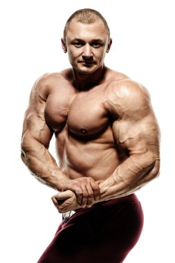 vücut geliştirmeci poz. Yakışıklı güç atletik adam erkek. Fitness