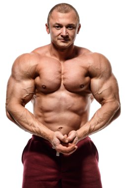 vücut geliştirmeci poz. Yakışıklı güç atletik adam erkek. Fitness