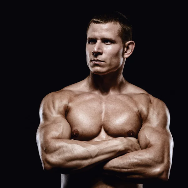 Muskulöser und fitter junger Mann Bodybuilder Fitness männliches Modell posiert — Stockfoto