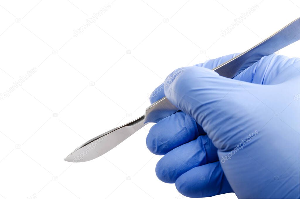 hand of surgeon in blue glove holding a scalpel isolated on white bacground