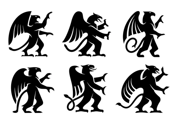 Heraldic griffins with raised paws — Stock Vector