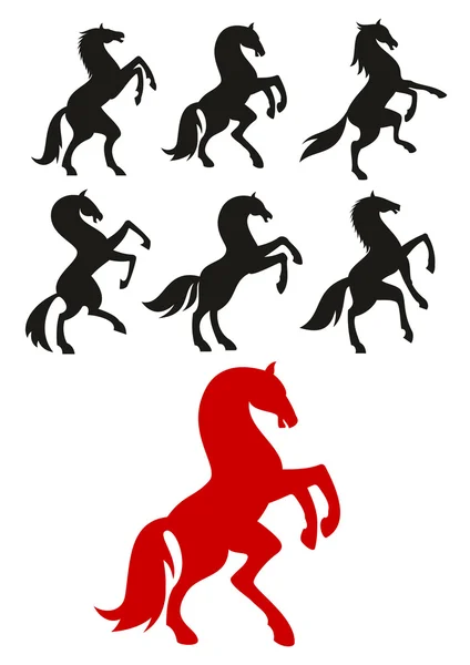 Opfok-en steigerende paarden silhouetten — Stockvector