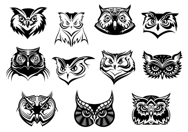 Large set of black and white owl heads — Stock Vector