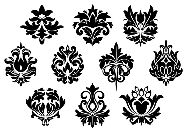 Чорні квіткові та арабеські елементи — стоковий вектор