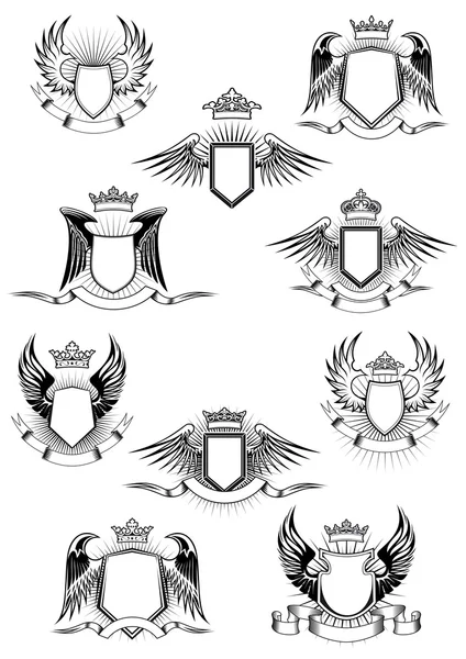 Heraldic winged shields with crowns and ribbon banners — Stock Vector