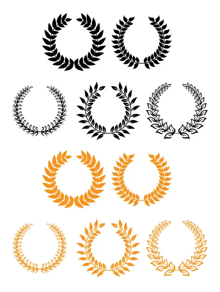 葉状の紋章セットおよび月桂樹の花輪 — ストックベクタ