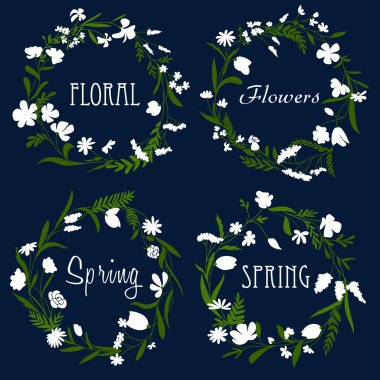 Wreaths with white flowers and herbs