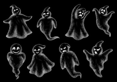 Set of Halloween ghosts on a blackboard