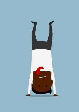 Cartoon businessman doing yoga handstand pose clipart