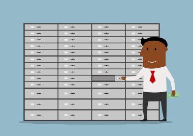 Happy manager in bank near deposit box