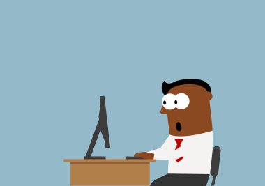 Surprised businessman goggled eyes at the monitor