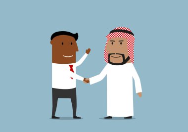Handshake of american and arabian businessmen