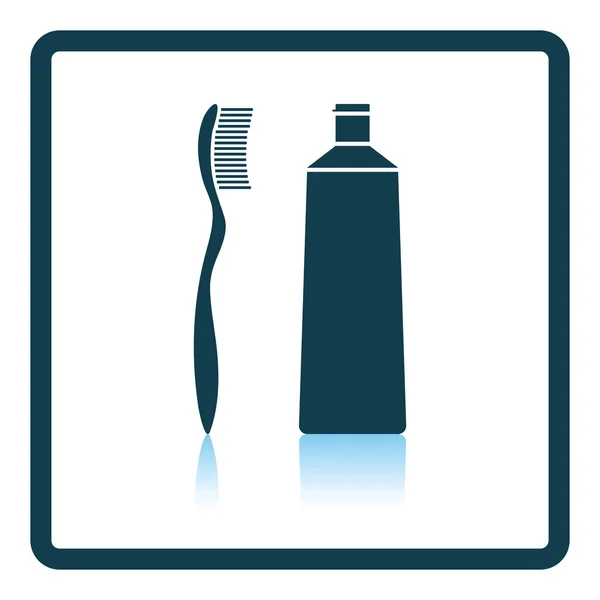 Icono de pasta de dientes y cepillo — Vector de stock