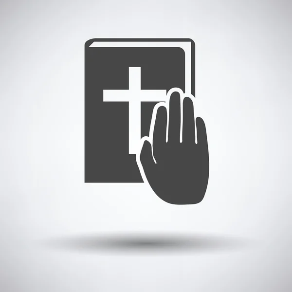 Hand on Bible icon — Stock Vector