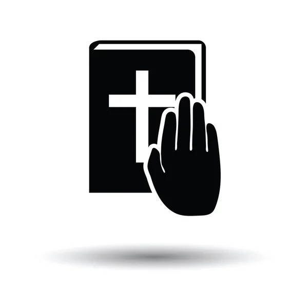 Hand on Bible icon — Stock Vector