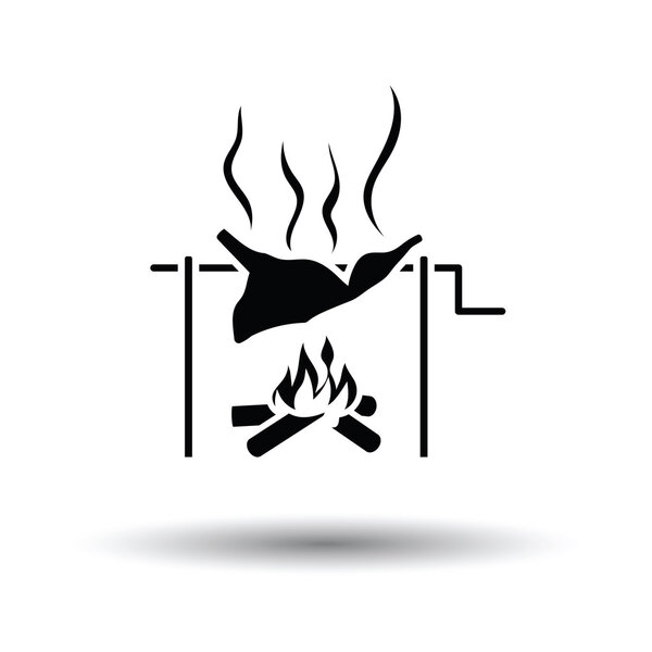 Roasting meat on fire icon