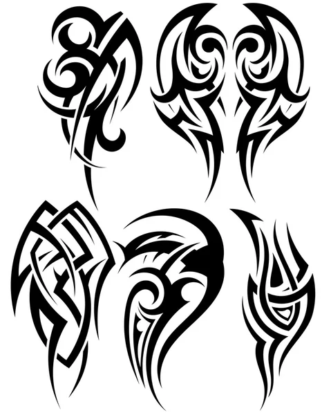 Set of tribal tattoos — Stock Vector