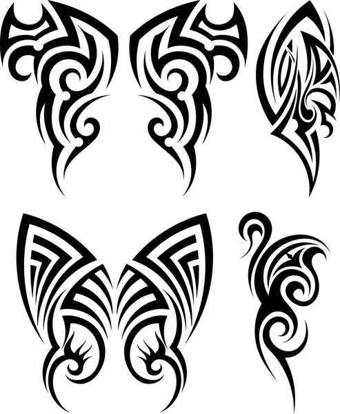 Set of tribal tattoos — Stock Vector