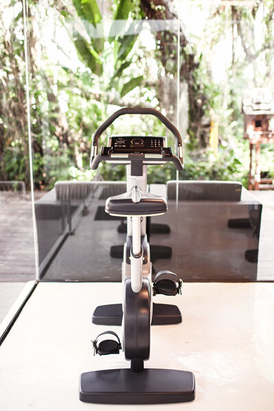Modern gym interior with equipment and a beautiful view