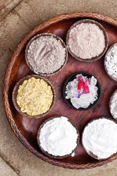 Sea Salt Different Grinding in Bowls on Light Background