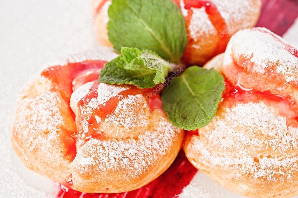 Fruits profiterole, french dessert with mint