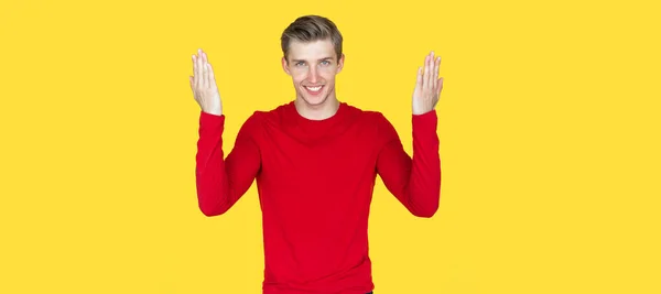 Young Man European Appearance Yellow Background Confidential Smile Raises Open — Stock Photo, Image